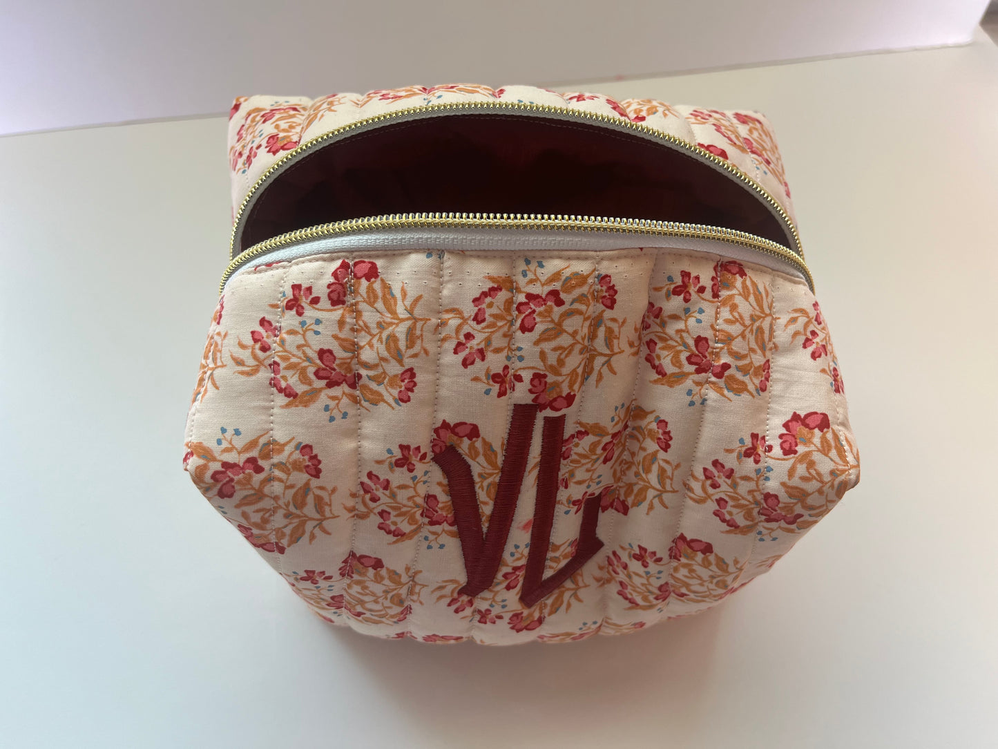 Large size cosmetic boxy pouch.
